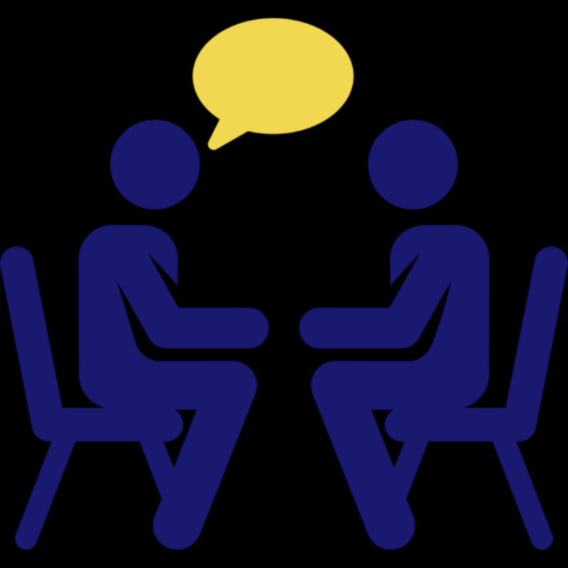 two person sitting and having a conversation 