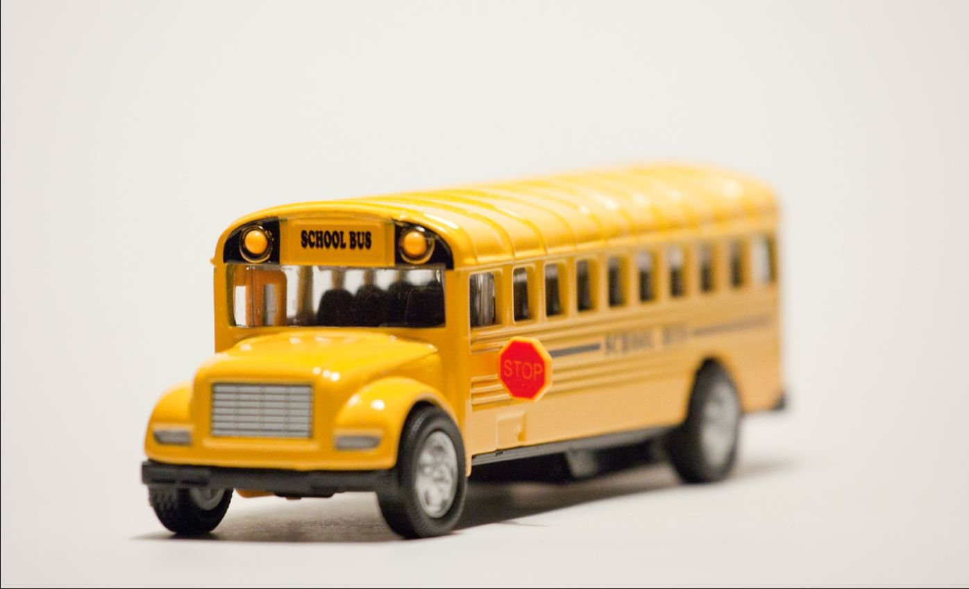 A toy yellow school bus